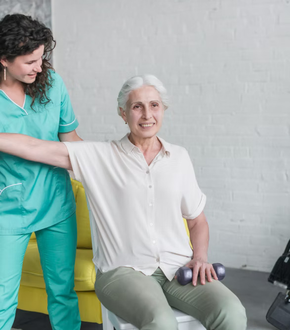 Occupational therapist assisting a patient with an arm exercise